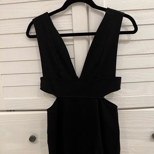 Black deep cut cocktail dress with cutouts